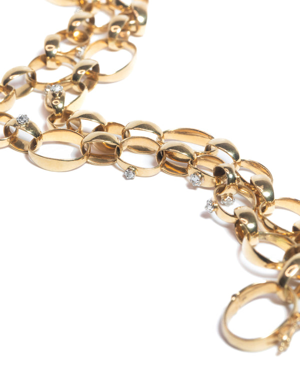 inverted diamond and gold bracelet