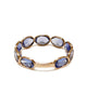 oval cut tanzanite and yellow gold ring