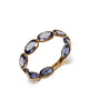 oval cut tanzanite and yellow gold ring